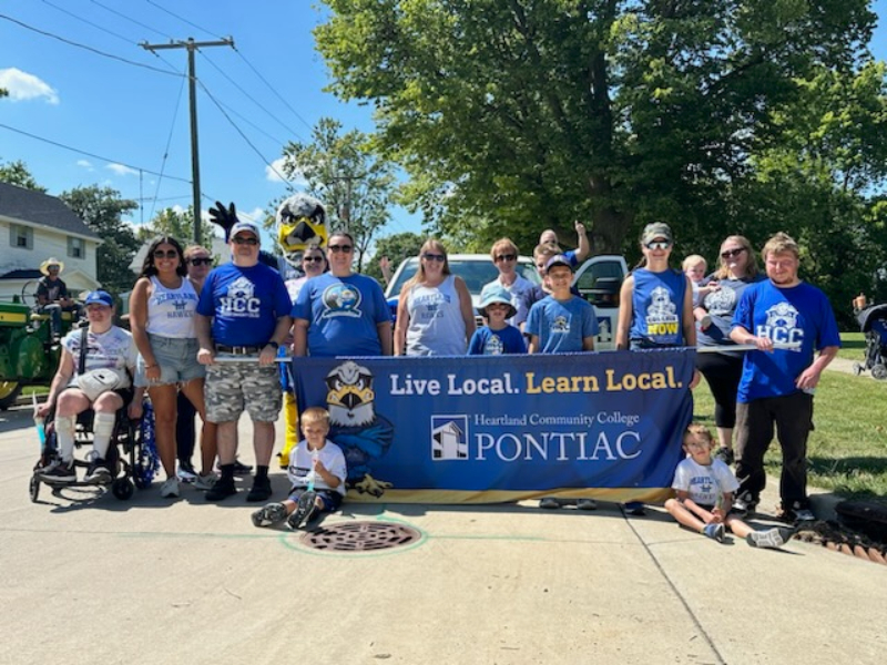 Employees participate in local parade