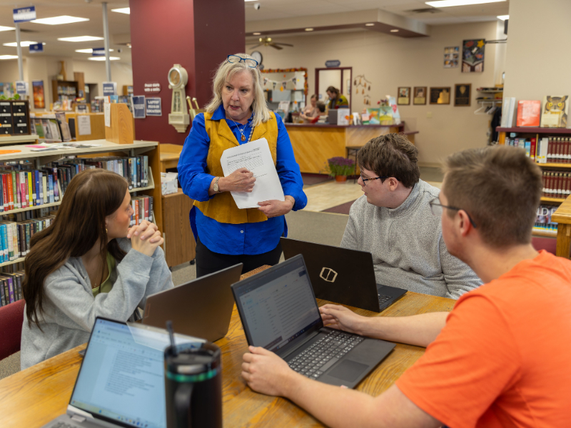 Students meeting during class